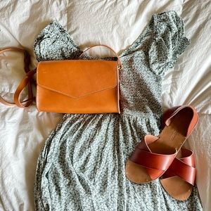 NWOT. The Astoria Crossbody by Portland Leather Goods. Minor external flaws.